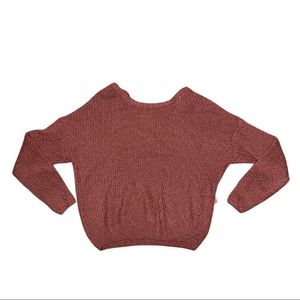Orange knit sweater with silk tie in back!